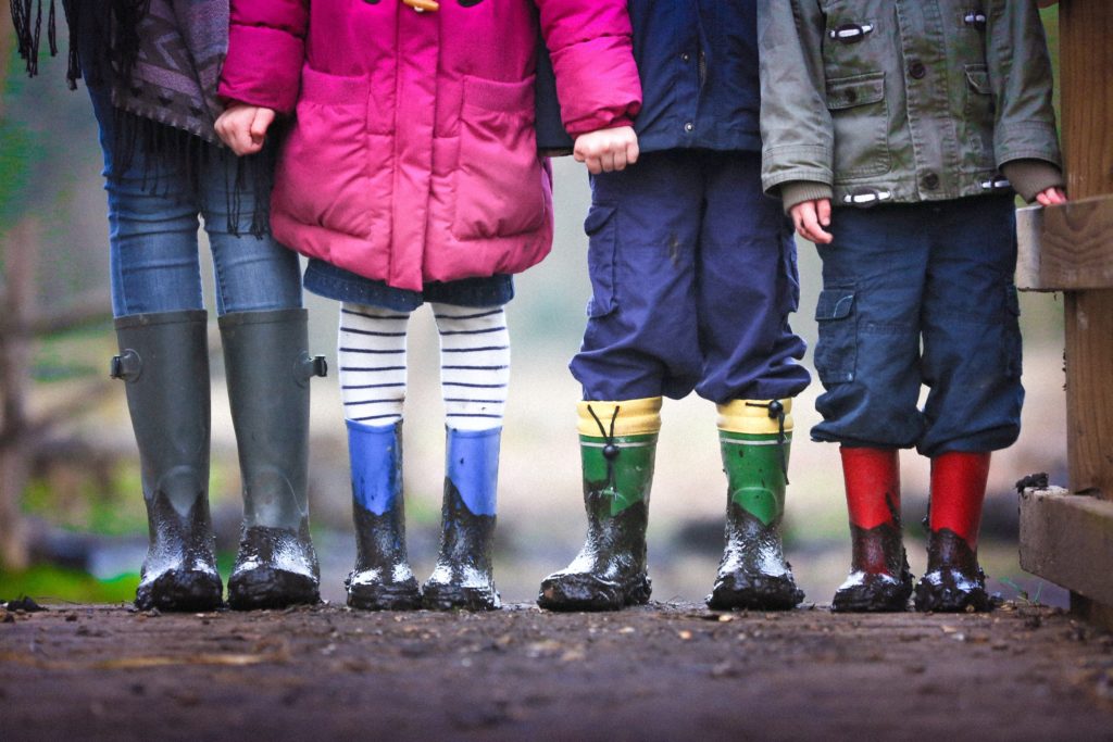 ben-wicks-unsplash-idealist-idealistic-idealism-kids-standing-rainboots