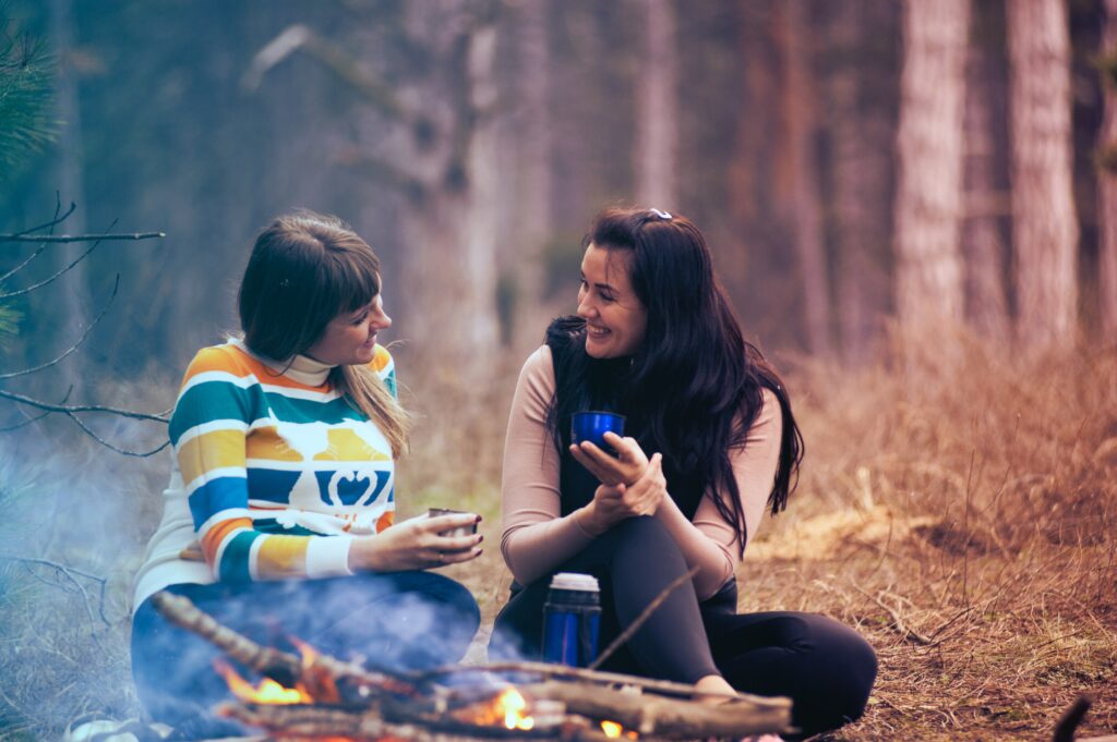 meaningful conversation outside two people talking camping thatseemsimportant