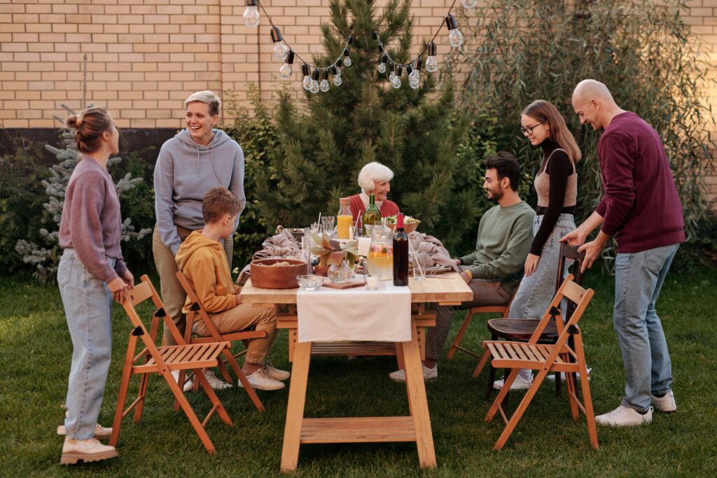 White Family Having Dinner Outside - That Seems Important How Dangerous Ideas Spread Image